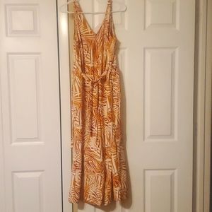 Super cute NWOT capri romper.
